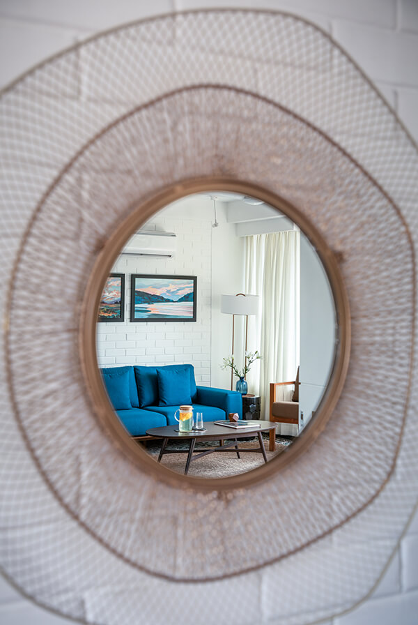 Royal blue sofa at a 1bhk apartment in Parra-Assagao