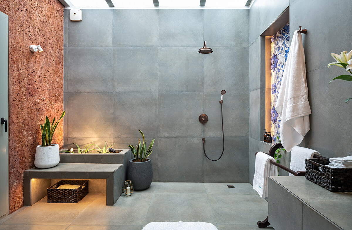 Grey IPS walled bathroom at a villa in Vagator
